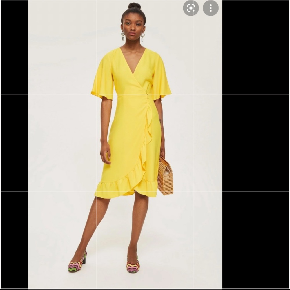 BNWT Beautiful yellow wrap dress.